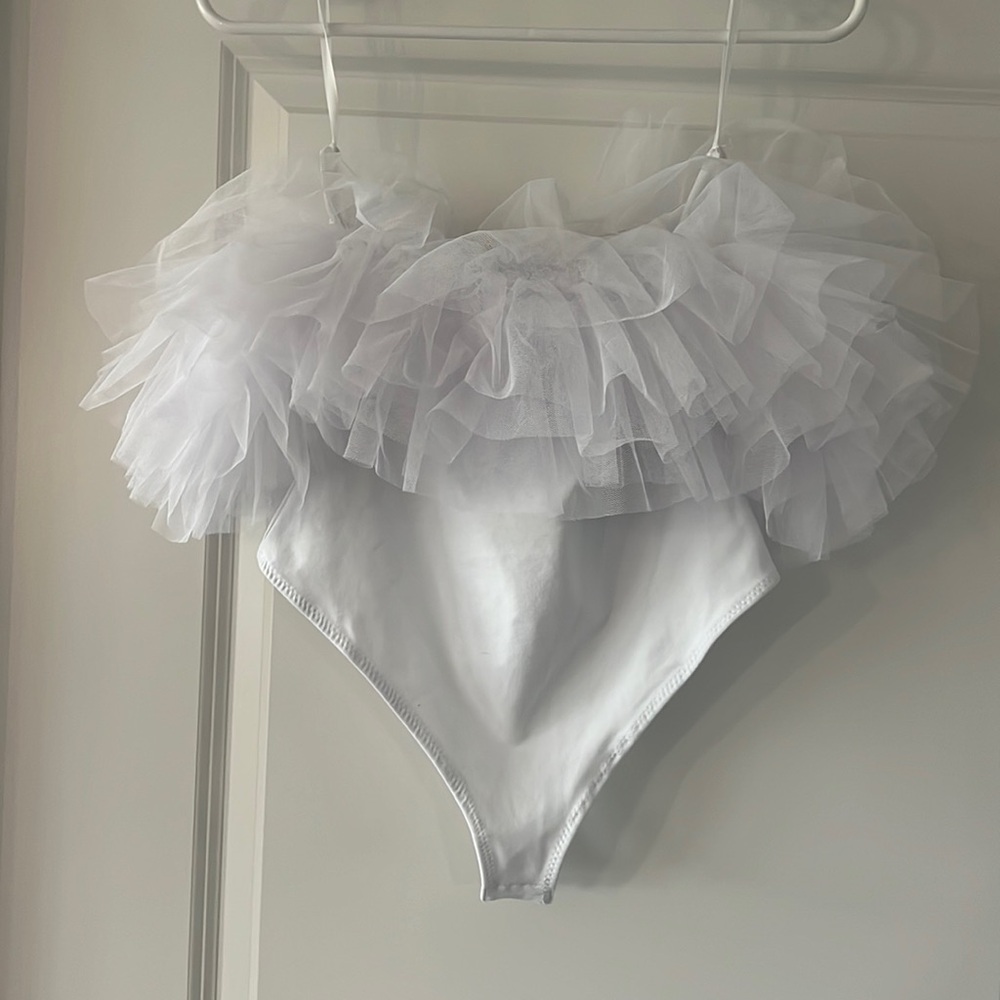 Free people. Size small. White body suit. Worn once for my bachelorette party!
